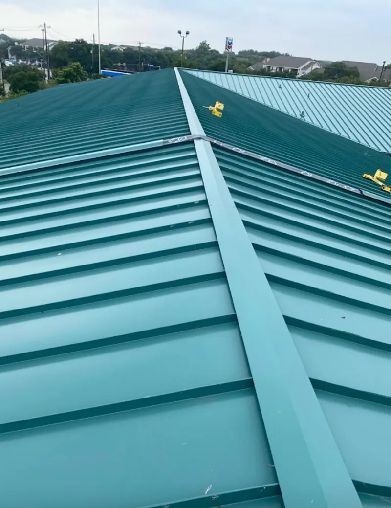 Green commercial metal roof ridge and valley for Metal Roof Repair in Brookhaven